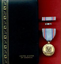 Air Force Good Conduct Medal in Case with ribbon bar and lapel pin