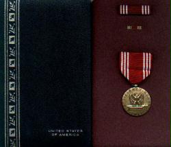 Army Good Conduct medal in case with ribbon bar and lapel pin