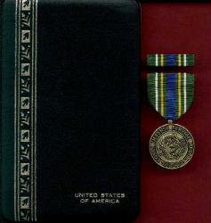 Korean Defense Award medal in case with ribbon bar and lapel pin