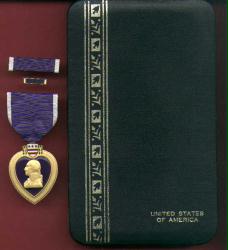 Vietnam Purple Heart Medal with ribbon bar and lp in Case