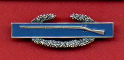Combat Infantry Badge showing wreath and rifle CIB